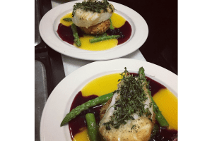 Evan's American Gourmet Cafe in South Lake Tahoe, CA Halibut with Mango and Blueberry Coulis DiRoNA Awarded Restaurant