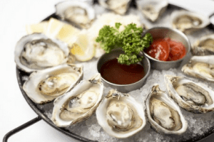 Splash Seafood Bar & Grill in Des Moines, IA Oysters on the Half Shell DiRoNA Awarded Restaurant