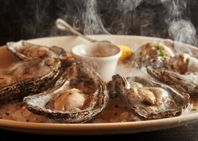 GW Fins in New Orleans, LA Smoked Sizzling Oysters DiRoNA Awarded Restaurant